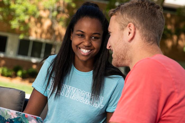 Two Jacksonville University students studying.